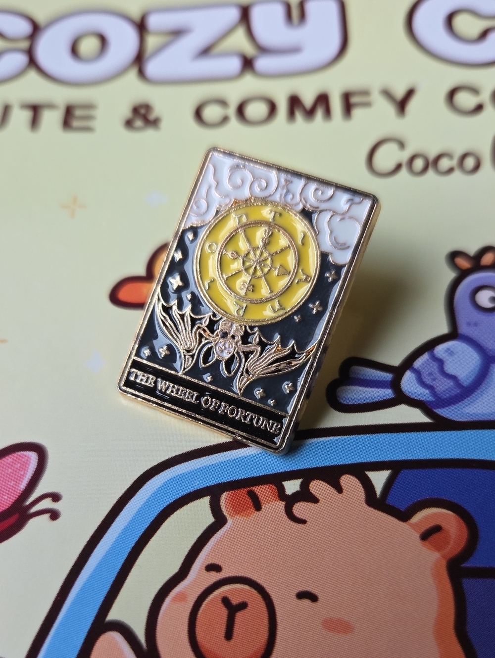 The Wheel of Fortune Tarot Enamel Pin in Yellow & Black